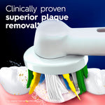 Closeup render of an Oral‑B round brush head with angled colored bristles cleaning a tooth, with 'superior plaque removal' text.