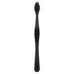 Isolated black Oral-B charcoal toothbrush photographed flat on white background showing full handle and brush head