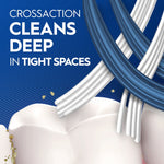Illustrated close-up of crossed blue and white toothbrush bristles cleaning between teeth