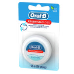 Oral‑B EssentialFloss mint waxed dental floss in blister pack photographed at slight angle