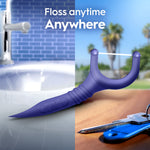 Close-up purple Oral-B Glide floss pick displayed over split scenes of a sink and a set of keys with text ‘Floss anytime Anywhere’.