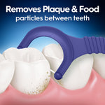 Close-up illustration of a purple Oral-B floss pick removing food particles from between white teeth against a blue background with benefit text.