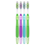Four Oral‑B manual toothbrushes standing side-by-side with green, purple, blue and green handles on white
