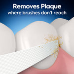 Close-up graphic of textured Oral-B Glide floss sliding between teeth removing plaque where brushes don’t reach.