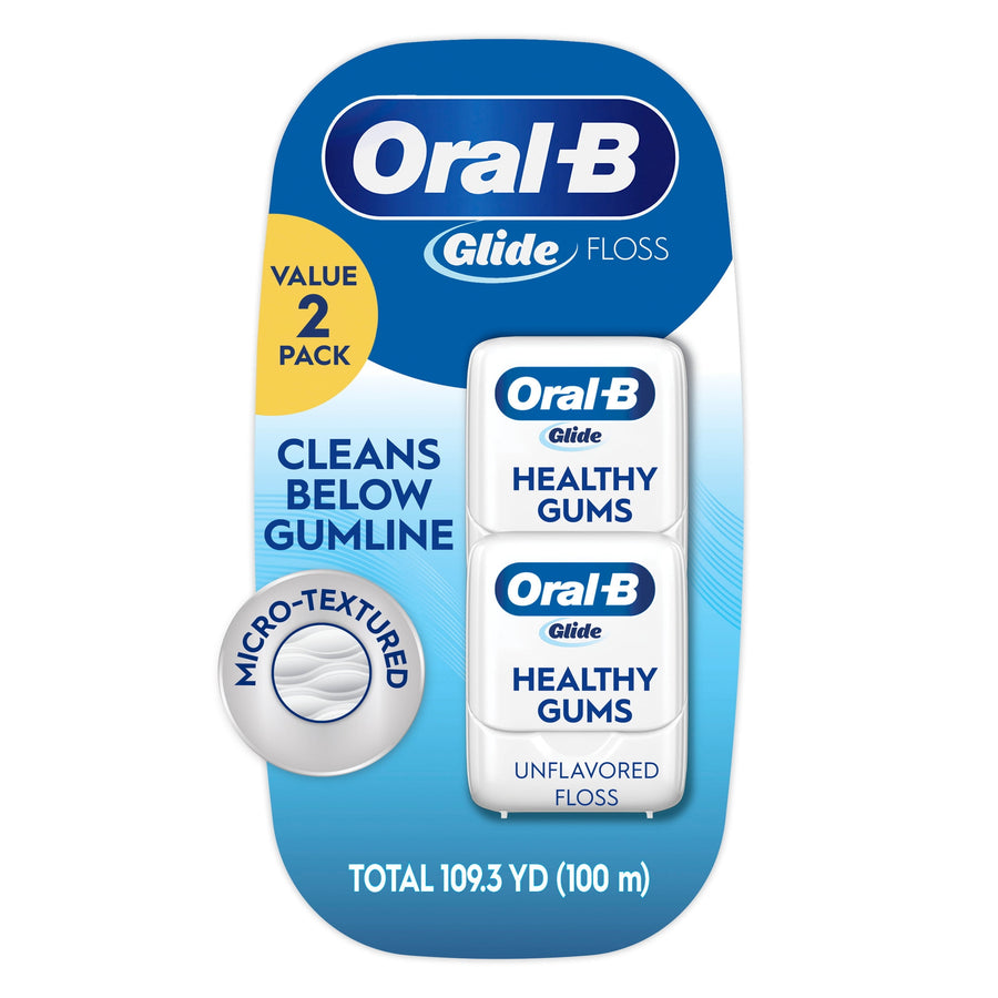 Oral-B Glide Healthy Gums unflavored floss two-pack blister card showing two white floss containers and micro-textured badge