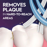 Close-up graphic of toothbrush bristles cleaning between teeth with text 'Removes Plaque in Hard‑To‑Reach Areas' on purple background.