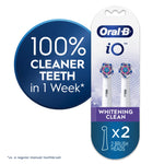 Oral-B iO whitening clean replacement brush heads packaging with promotional 100% cleaner teeth badge