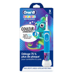 Oral‑B Kids toothbrush packaging in French with chameleon artwork, toothbrush on charger and color‑changing bristles callout.