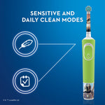 Vertical image of green Oral‑B kids electric toothbrush showing two modes icons and 'sensitive and daily clean modes' text