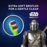 Close-up graphic of toothbrush head and text claiming extra soft bristles alongside The Mandalorian character