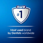 Oral-B branded shield graphic stating #1 most used brand by dentists worldwide on a blue background