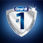 Shield-shaped badge with Oral‑B logo and a large #1, labeled dentist recommended floss brand on blue background