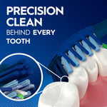 Closeup illustration of toothbrush bristles reaching behind teeth with magnified inset and 'Precision clean' text
