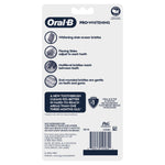 Back of Oral‑B Pro‑Whitening toothbrush packaging with icons and text listing features like whitening bristles and flexing sides.