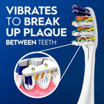 Oral‑B toothbrush head graphic with callout showing vibration action breaking up plaque between teeth