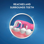 Circular product graphic depicting an Oral-B toothbrush head reaching and surrounding stylized teeth to illustrate cleaning action.