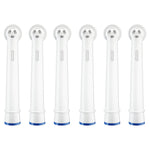 Six white Oral‑B replacement brush head stems displayed upright against a white background with blue base rings.