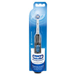 Oral-B Revolution black electric toothbrush visible in clear blister card packaging with blue backing