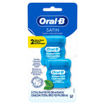 Front of Oral‑B Satin waxed mint dental floss 2‑pack blister card showing two blue floss containers