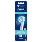 Oral‑B retail blister-pack style artwork showing a single replacement brush head with X‑shaped bristles and Sensitive & Gum branding
