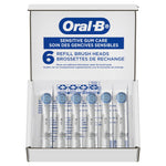 Front view of an open Oral‑B Sensitive Gum Care refill display box showing six replacement brush heads in clear sleeves