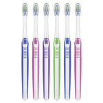 Six individual Oral-B manual toothbrushes lined up showing colored handles and multi-level bristle heads