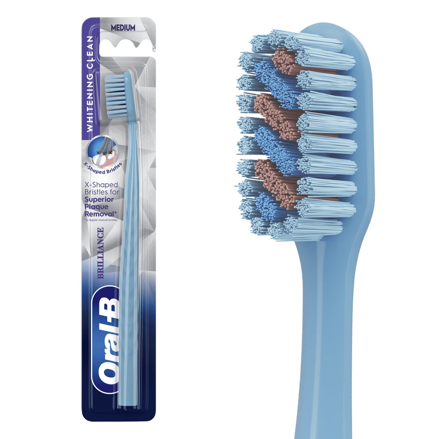 Oral-B sky-blue Pro Whitening Brilliance toothbrush in blister pack with visible bristles and branding