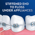 Illustration of teeth with braces and floss threading under wire with text "Stiffened end to floss under appliances."