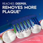 Illustration of an Oral‑B toothbrush head cleaning between molars with headline 'Removes more plaque' on blue background