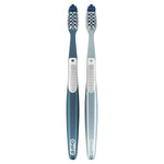 Two Oral-B manual toothbrushes side-by-side showing handles and brush heads on a white background