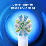 Close-up macro view of an Oral‑B round brush head showing clustered bristles with a blue radial background and text about dentist‑inspired design.