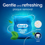 Blue promotional graphic featuring a single Oral‑B Waxed Mint floss container with mint leaves and benefit callouts