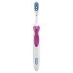 White and pink Oral-B battery-powered toothbrush shown upright on a white background