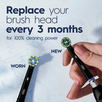 Instructional graphic showing a worn Oral‑B brush head beside a new one with text advising to replace brush heads every three months.