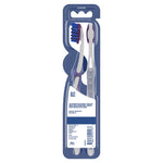 Back view of Oral-B toothbrush blister pack showing two toothbrushes in clear plastic with product information panel