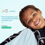 Smiling child reclining against a pale blue background with Ordo logo, testimonial text and Trustpilot five-star graphic.