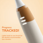 Angled close-up of the Ordo Sonic Kids toothbrush neck and handle with three progress lights lit and progress tracked text