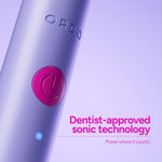Close-up of a lavender Ordo Sonic Edge toothbrush handle showing embossed logo, power button, and sonic technology text.