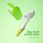 Floating lime Ordo Sonic Edge toothbrush with travel cap removed, showing the brush head and travel cap nearby.