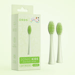 Light green Ordo Sonic Kids replacement brush heads packaging with two green-bristled toothbrush heads displayed beside the box.