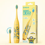 Product shot of yellow Ordo Sonic Kids Minions toothbrush, extra brush head and boxed packaging on a light background.