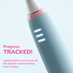 Macro view of the Ordo toothbrush neck and lit progress lights with text highlighting tracked brushing progress.