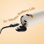 Close-up of the Ordo toothbrush base with USB-C charging cable plugged into a rubber port and 5+ weeks battery life text