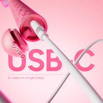 Pink Ordo toothbrush interior showing USB-C charging cable plugged into the base cap