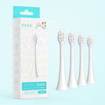 Four white oval sonic toothbrush heads beside Ordo branded product box on pale blue background