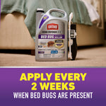 Ortho Home Defense Max jug and attached Comfort Wand sitting on carpeted floor in front of a bed, promotional 'Apply every 2 weeks' banner below.