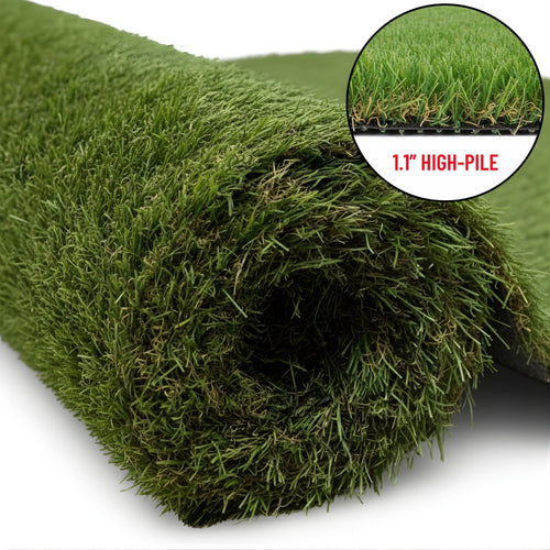 Rolled green artificial turf close-up showing dense, realistic grass fibers and backing edge detail.