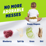 Green panel showing baby from behind and sample stain swatches labeled blueberry, spit up, grass and dirt with no more adorable messes text