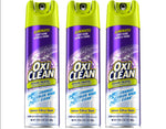 Three OxiClean Foam-Tastic foaming bathroom cleaner spray cans with purple labels and green caps