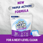 OxiClean pouch on textured background with scoop of powder and headline promoting triple action formula